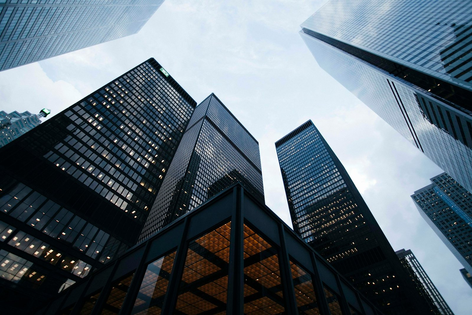 Modern commercial buildings representing professional financial services