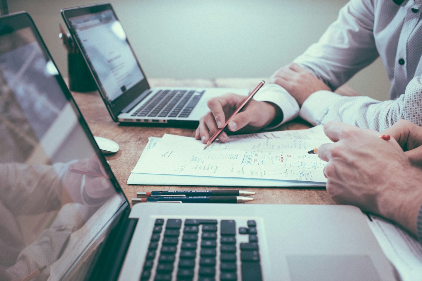 Advisors reviewing a structured financial plan